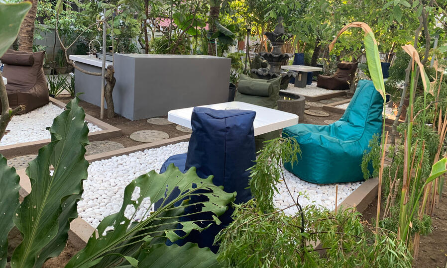 Garden with Open Air Kitchen Tropical garden area at Nomads Home Bali